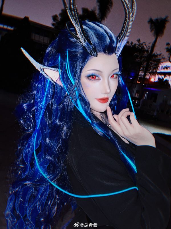 瓜希酱傲闰COS赏析:哪吒之魔童闹海蓝焰红瞳的视觉冲击力 瓜希酱傲闰COS赏析:哪吒之魔童闹海蓝焰红瞳的视觉冲击力