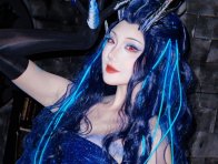 瓜希酱傲闰COS赏析:哪吒之魔童闹海蓝焰红瞳的视觉冲击力