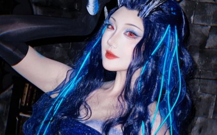 瓜希酱傲闰COS赏析:哪吒之魔童闹海蓝焰红瞳的视觉冲击力